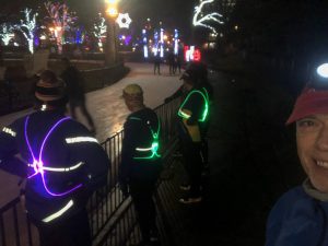 Runners take a break to watch the skaters at Gage Park.