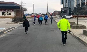Group of runners head out on their run.